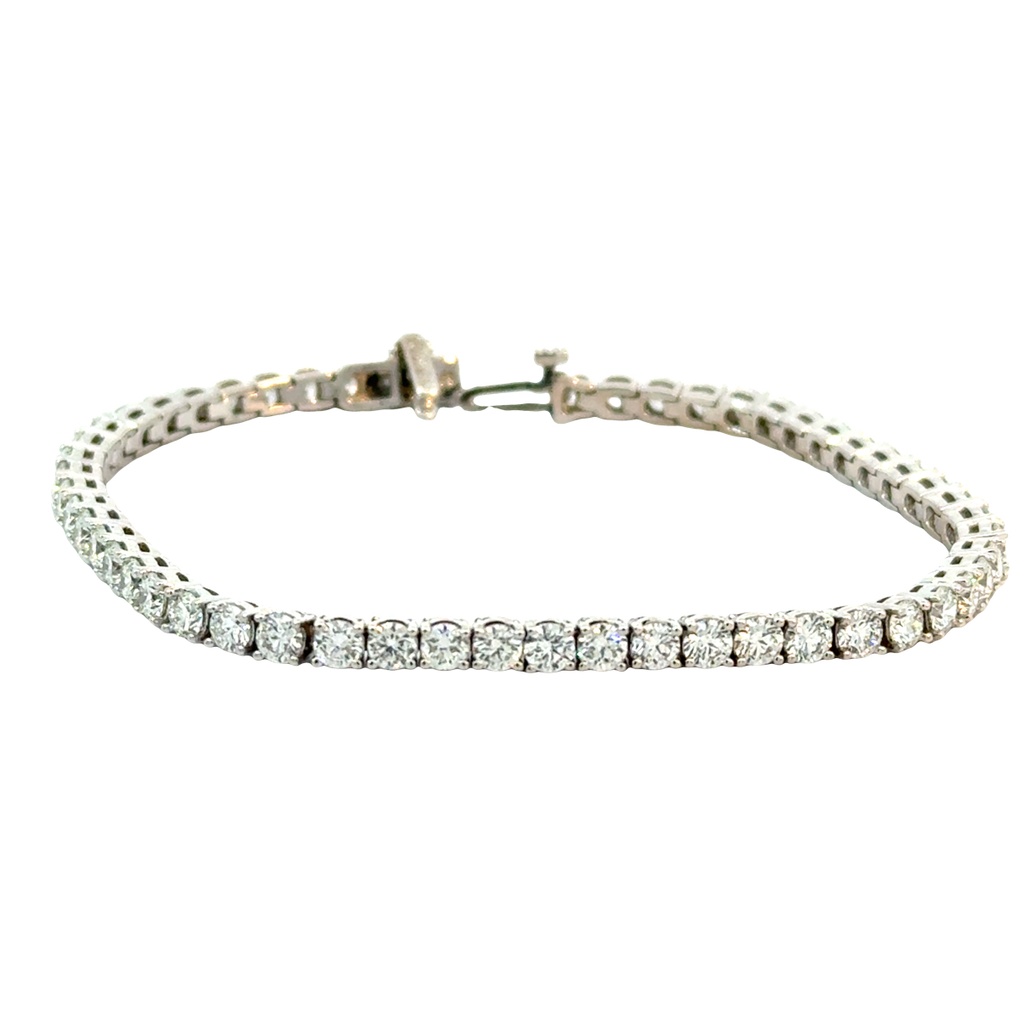 14Kt White Gold Tennis Bracelet With (54) Round Diamonds Weighing 6.01cttw